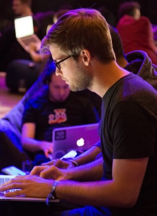 Man giving a presentation at a conference